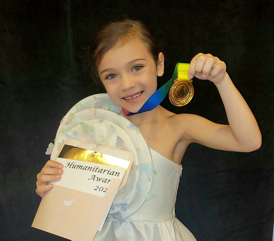 Young designer honored with Humanitarian of the Year at NYFW