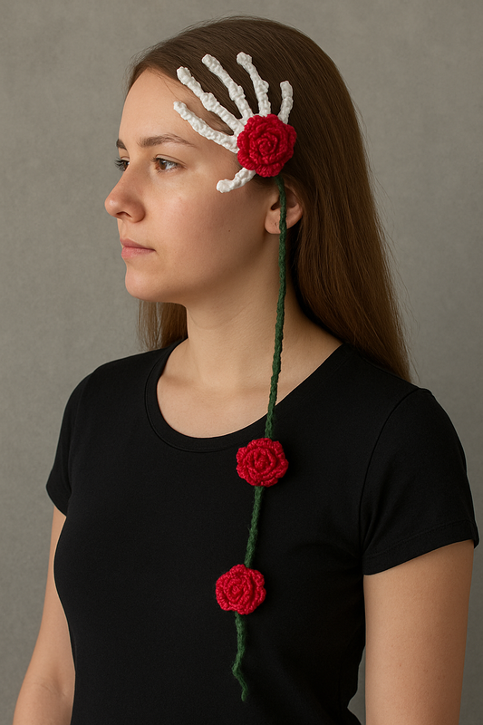 Skeleton hand hair clip with red cascading crochet flowers